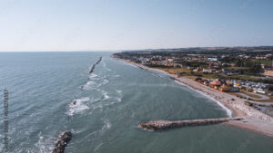 Italy, June 2022; aerial view of Fano with its sea, beaches, port, umbrellas in the marche region